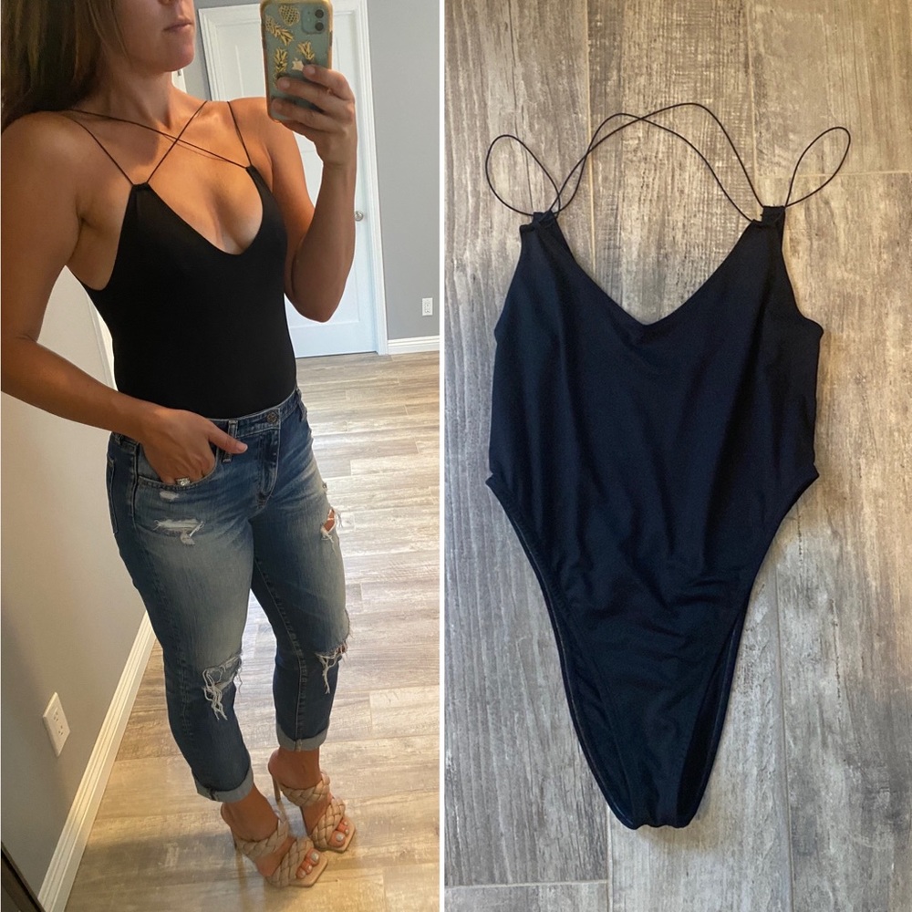 Fabletics medium body suit with thin straps.  Runs high on the sides.